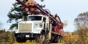 Dual Rotary truck driving up Vancouver Island
